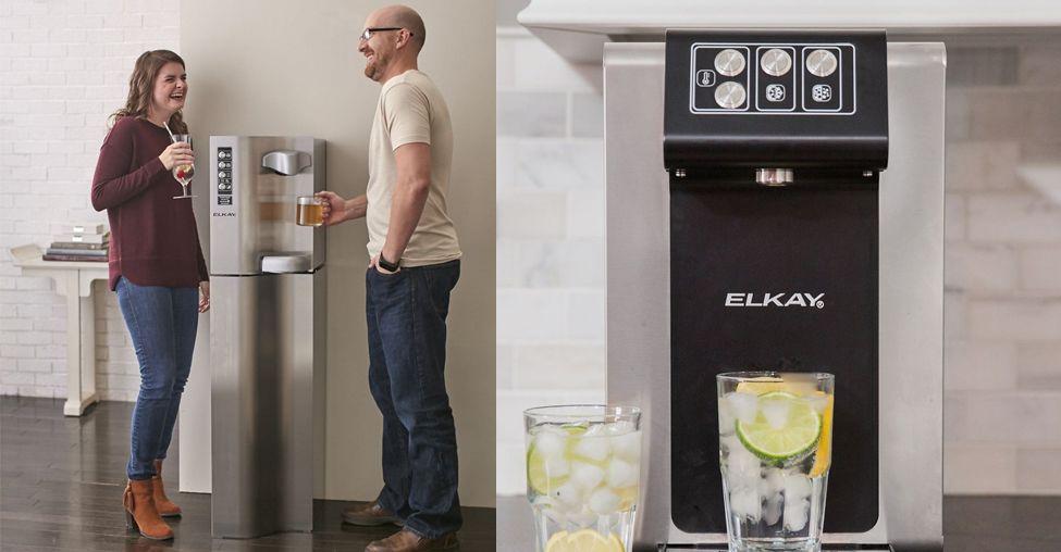 Homeowners gathered around an Elkay filtered water dispenser